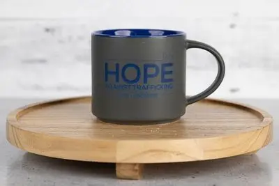 Gray 16 oz HOPE coffee mug with navy logo